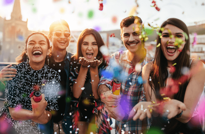a group of people party on a rooftop