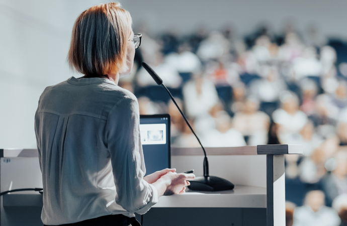 a speaker talking to a group
